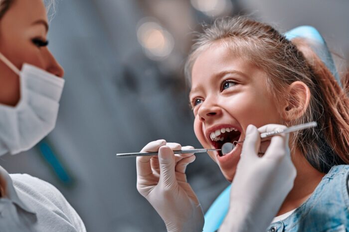 little girl getting teeth examined family dentistry dentist in Owings Mills Maryland